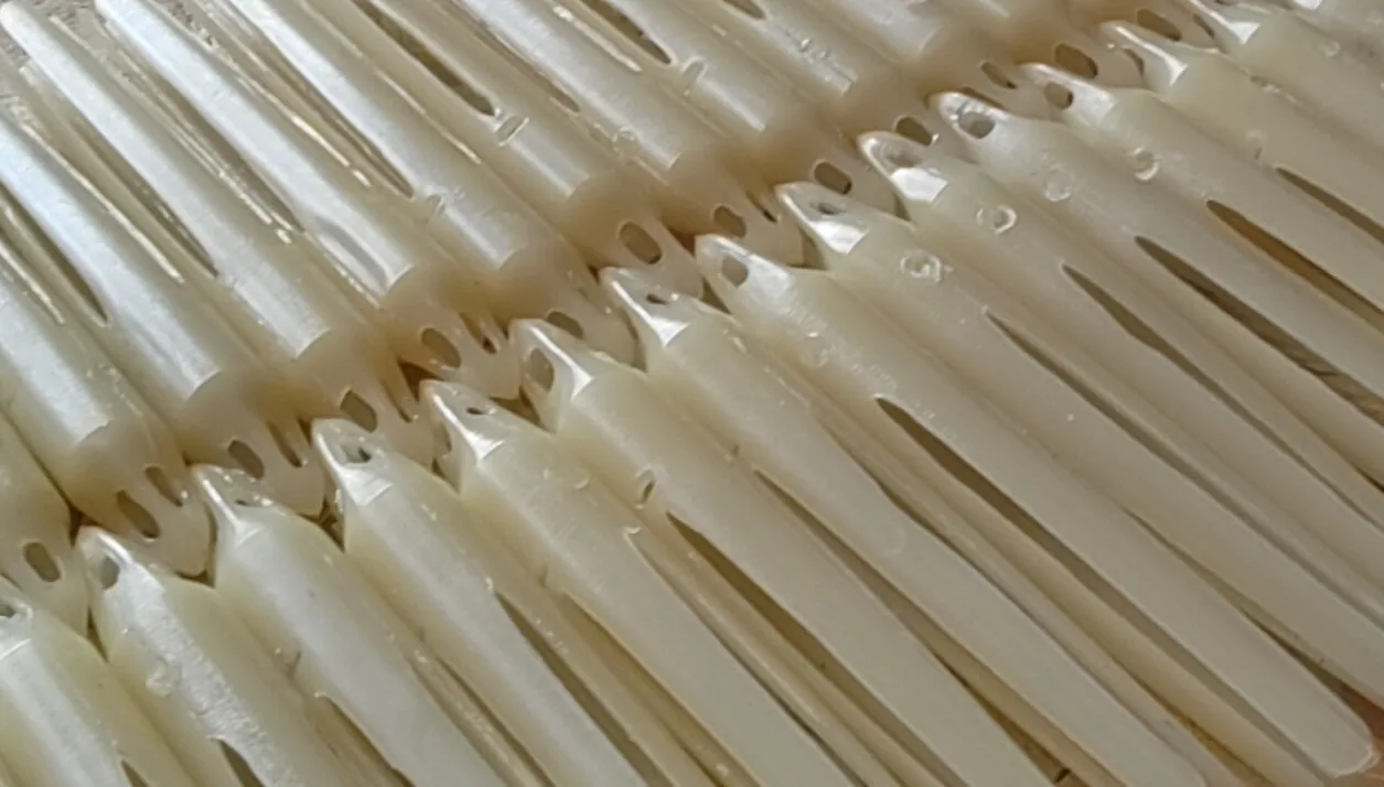 Manufactured bioplastic parts arranged after production
